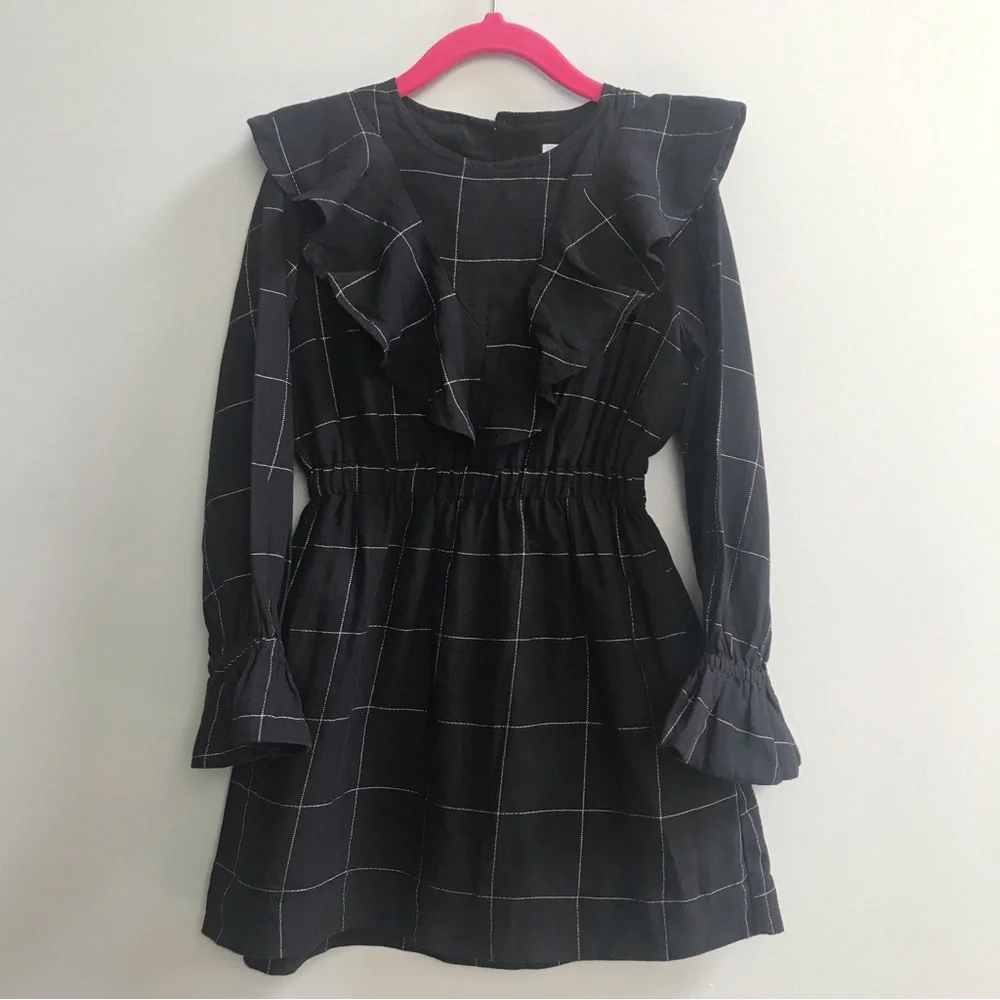 Nueces ruffled black dress, size 6A.